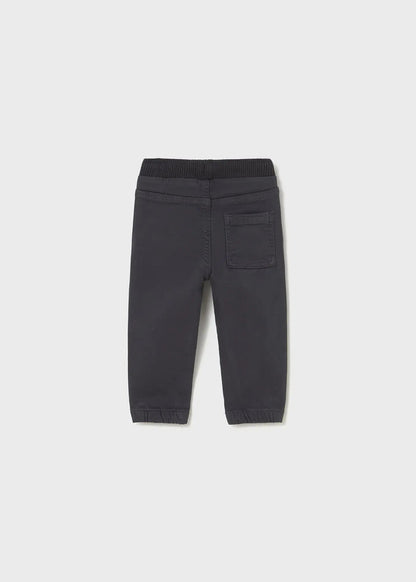 Flat view of Mayoral baby boy twill joggers showing tapered leg shape and solid charcoal color.