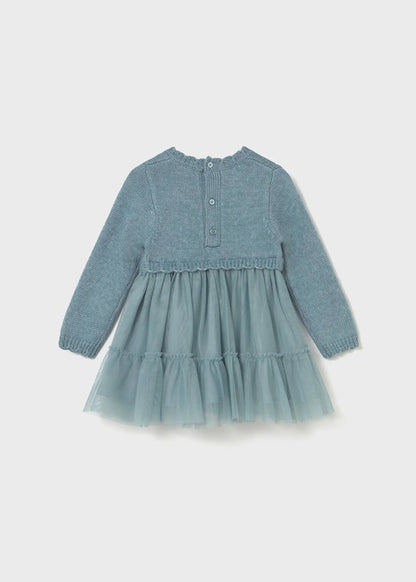 Back view of Mayoral baby girl knit tulle dress showing button closure and layered skirt.
