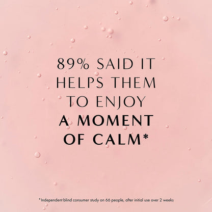 Pink textured background with bubbles and text about enjoying a moment of calm with NEOM Complete Bliss