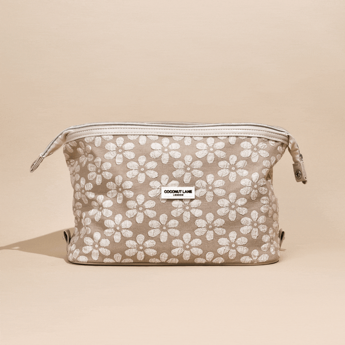 Beige expandable makeup bag with white floral pattern, Mocha Flower design by Coconut Lane.