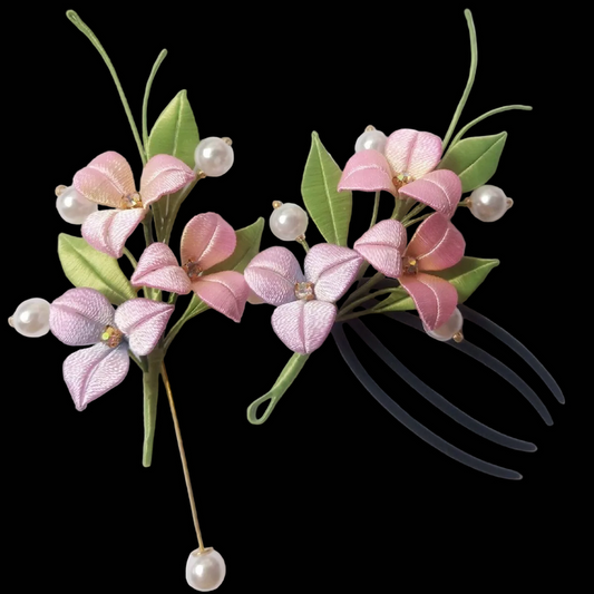 Handcrafted Chanhua Bougainvillea brooch and hair clip featuring vibrant magenta thread-wrapped petals and green leaves.