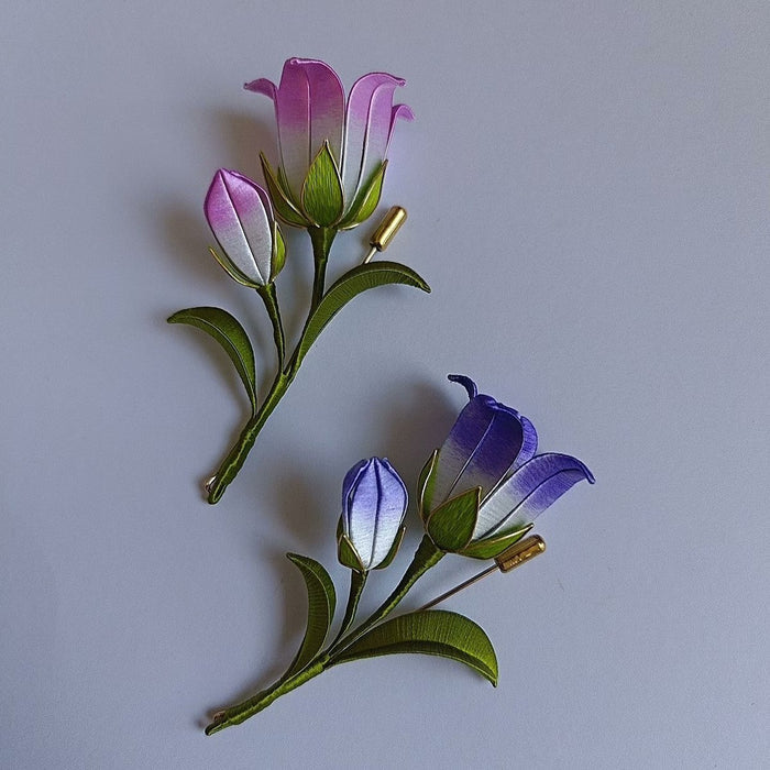 3D thread-wrapped Campanula pins made with intricate artisanal Chanhua floral techniques.