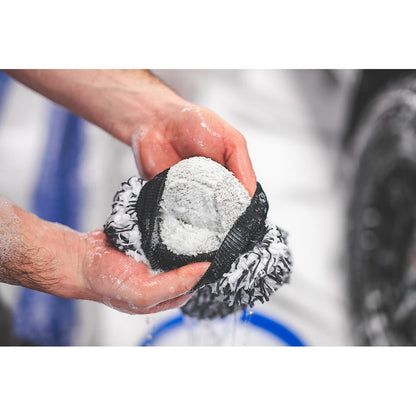 Interior of a black and white microfiber wash mitt